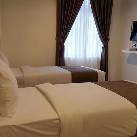 เครสเซนโด บูติก โฮเทล Hotel Hock Lam Village ภายนอก รูปภาพ