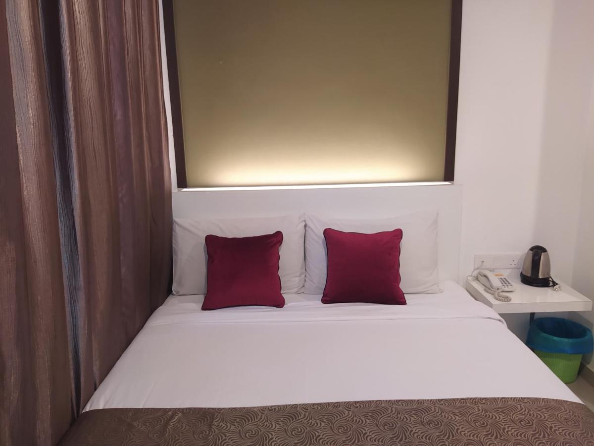 เครสเซนโด บูติก โฮเทล Hotel Hock Lam Village ภายนอก รูปภาพ