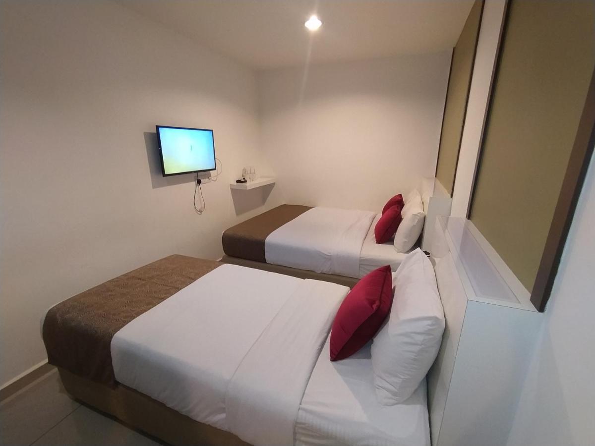 เครสเซนโด บูติก โฮเทล Hotel Hock Lam Village ภายนอก รูปภาพ