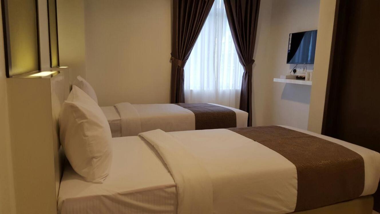 เครสเซนโด บูติก โฮเทล Hotel Hock Lam Village ภายนอก รูปภาพ